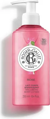A pink bottle of Roger & Gallet Rose Wellbeing Body Lotion with a pump dispenser.