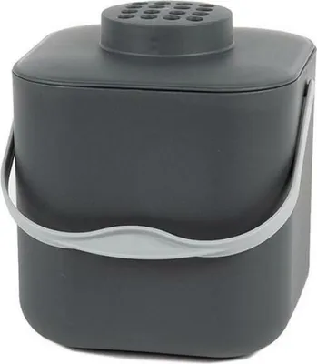 A dark gray compost bin with a light gray handle and a lid with ventilation holes.