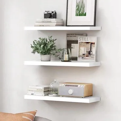 Immagine prodotto di Set di 3 mensole sospese Unyqoos®, colore bianco, in MDF con sistema di fissaggio invisibile, dimensioni approssimative: 15,7 pollici x 6 pollici. Mensole da parete adatte per camera da letto, bagno, soggiorno e cucina