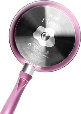 The underside of a pink frying pan with a silver handle, showing branding and product information.
