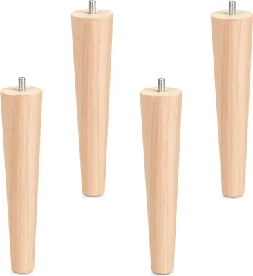 Four wooden furniture legs are arranged in a row against a white background.