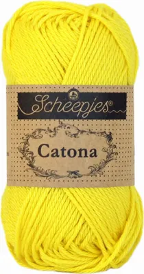 A ball of yellow yarn with a paper label.