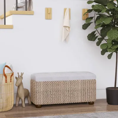 A hallway or entryway setting with a bench, storage basket, and decorative deer figurine.