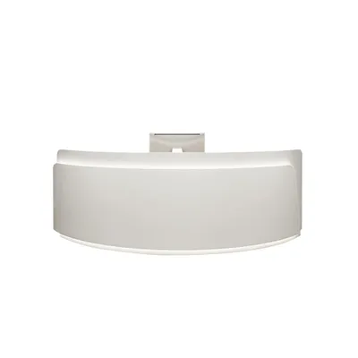 A white reception desk with a curved front and integrated lighting.