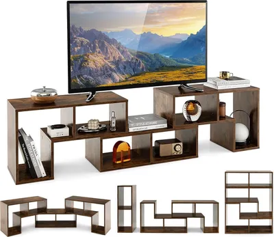 A TV stand with multiple shelves and compartments, displaying various decorative items and books. A television is placed on top.