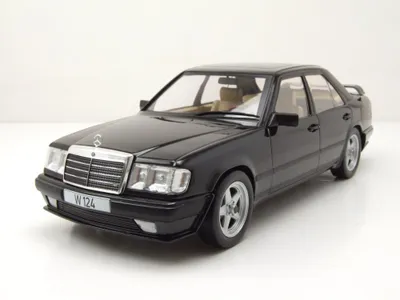 Produktbild von MCG 18341 Mercedes W124 Tuning 1986 schwarz metallic 1:18