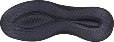 The sole of a black shoe.