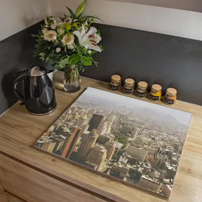 Zdjęcie produktu dla Jednoczęściowa płyta pokrywająca kuchenkę Banjado o wymiarach 60 x 52 cm z gumowymi podkładkami dystansowymi, szkło bezpieczne ESG z motywem Manhattan 1 [HAP1 11769]
