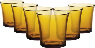 A set of six amber-colored drinking glasses arranged in a semi-circle on a white background.