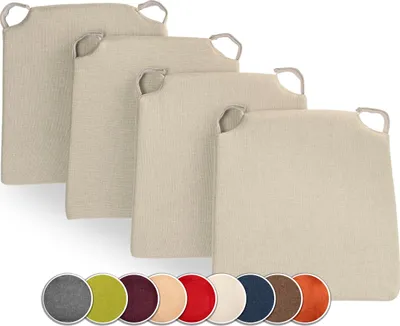 A set of chair cushions in various colors displayed with a main set of beige cushions in the foreground.
