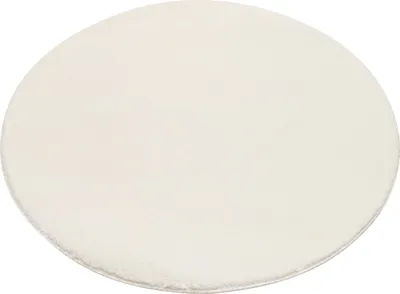 A round, cream-colored rug is shown from a slightly elevated angle against a white background.
