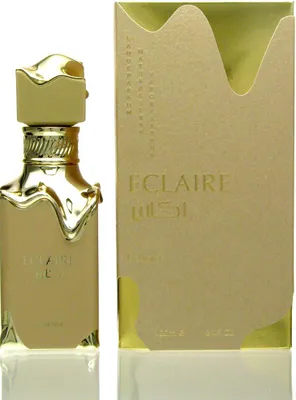 A perfume bottle and its box are displayed against a white background.