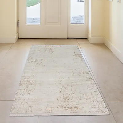 Zdjęcie produktu dla Błyszczący dywan do salonu w kolorze złoto-białym – wymiary: 80 x 150 cm