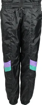 A pair of black track pants with purple and green color-blocking on the lower legs.