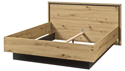 Doppelbett TRONDHEIM 160 x 200 in Artisan Eiche mit schwarzem Rahmen, Innenansicht des geöffneten Bettkasten mit Lattenrost.