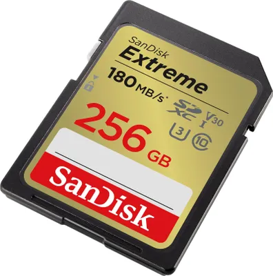 A close-up, angled shot of a SanDisk Extreme 256GB SDXC memory card against a white background.