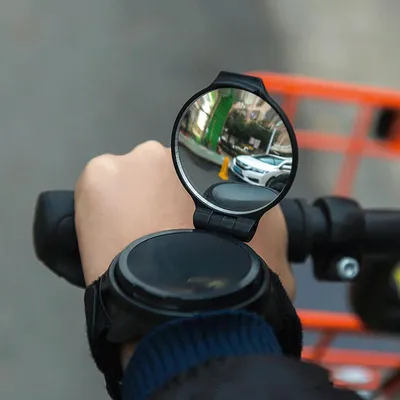 Immagine prodotto di Winkee - Specchietto retrovisore da polso | Accessorio pieghevole per bicicletta, e-bike, scooter elettrico | Specchietto per e-bike | Specchietto retrovisore per bicicletta, da montare sul polso, disponibile per la mano sinistra e destra | Regalo per ciclisti