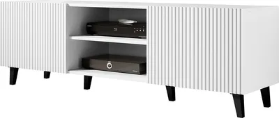A white TV stand with fluted doors and black legs, shown from the front.