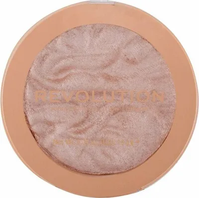 A top-down view of a makeup highlighter compact.