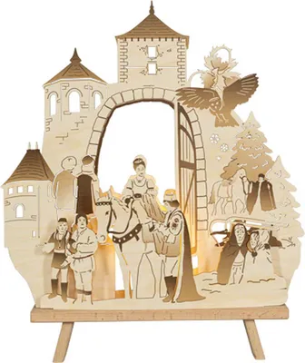 A wooden decorative light featuring a scene from "Three Hazelnuts for Cinderella" with a castle, figures, and a horse.