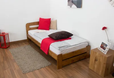 Produktbild von Einzelbett / Gästebett Kiefer Vollholz massiv Eichefarben A7, inkl. Lattenrost - Abmessungen: 90 x 200 cm