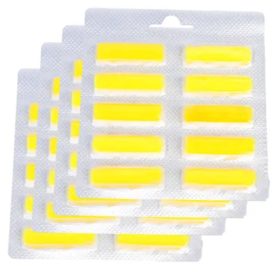 A stack of blister packs containing yellow scent sticks for an air freshener.