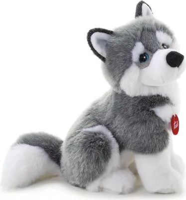 A plush toy husky dog sitting on a white background.