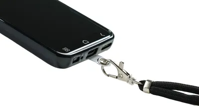 A close-up view of the bottom of a black smartphone with a lanyard attached to its charging port.