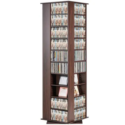 A tall, rotating shelf unit filled with CDs and DVDs.