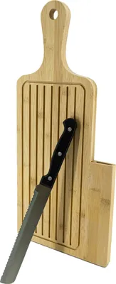 A bread cutting board with a serrated knife.
