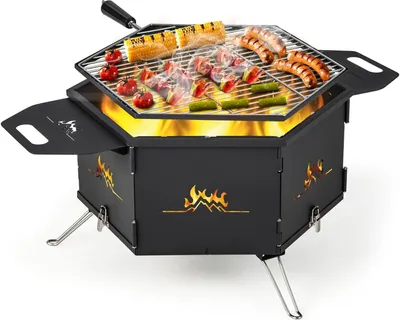 A black hexagonal portable charcoal grill with food cooking on the grate over flames.