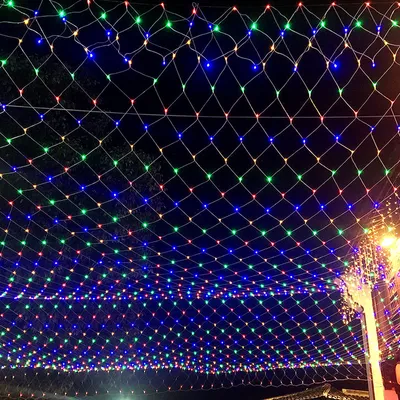 Produktbild von UISEBRT 6x2m LED Lichternetz Lichterkette Lichtervorhang Innen 8 Leuchtmodi Bunt für Weihnachten Halloween Party