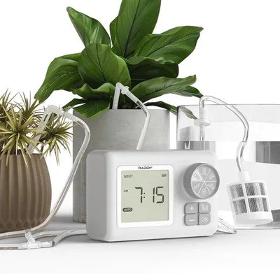 Productafbeelding van Famanu bewateringssysteem voor kamerplanten - Programmeerbare timer en waterniveau-indicator voor 15 potten
