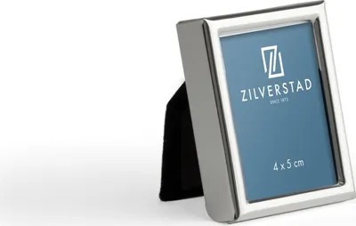 A silver photo frame with a black stand is shown against a white background.