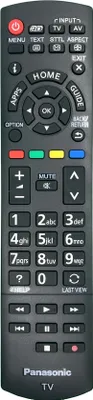 A close-up view of a black Panasonic TV remote control against a light gray background.