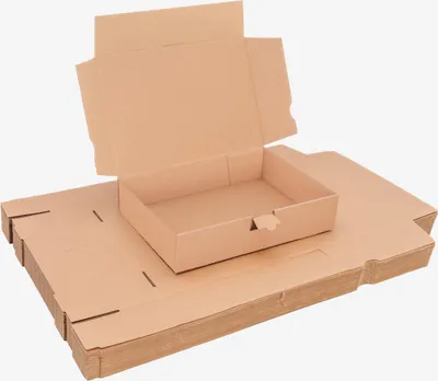 A stack of flat-packed cardboard boxes with one box partially assembled and open.