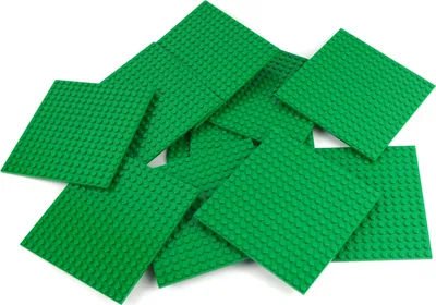 A pile of green LEGO baseplates.