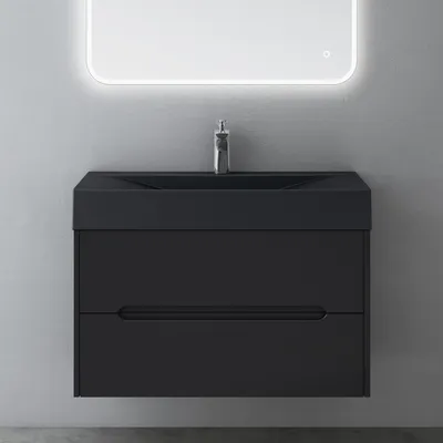 A modern black bathroom vanity with a sink and faucet, mounted on a gray wall.