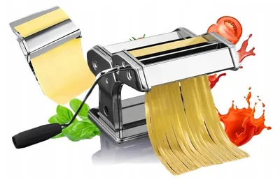 A pasta maker with fresh pasta dough, basil, and tomatoes.