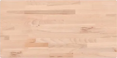 A close-up, top-down view of a butcher block style wooden countertop or table surface.