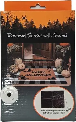 The image shows the packaging for a Halloween doormat sensor with sound. The packaging features a spooky forest scene with a spider, pumpkins, and a doormat with "Happy Halloween" written on it. It also includes an inset image showing how to hide the senso