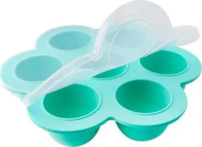 A teal silicone egg bite mold with a clear lid is shown on a white background.