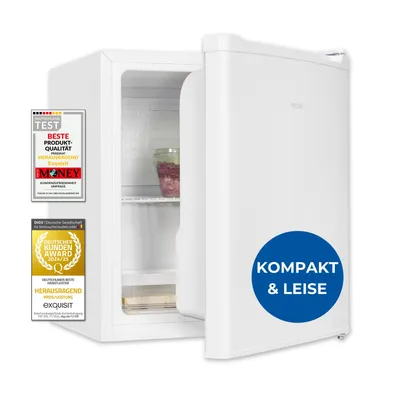 A white mini-refrigerator with its door open, displaying a jar of food inside. Several award badges are attached to the left side of the refrigerator, and a blue circular sticker with text is on the front door.