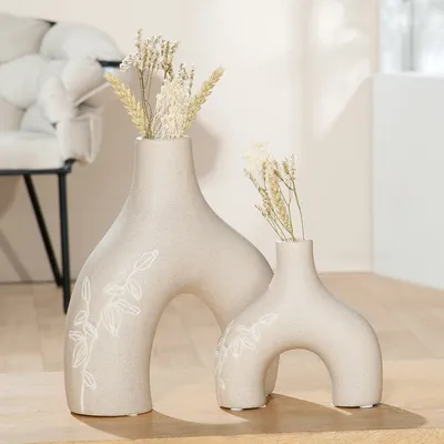 Produktbild von Gilde Vase, "Ginkgokranz", Ginkgomotiv, Keramik, beige, VE 3, L. 8,5 cm, B. 22 cm, H. 25,5 cm Höhe: 25.50 cm Breite: 22.00 cm Tiefe: 8.50cm  34383