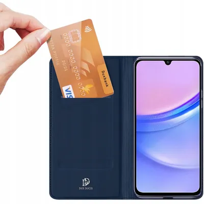 A hand is inserting a credit card into a blue phone case that has a slot for cards. A smartphone is visible inside the case.
