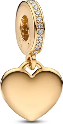 A close-up studio shot of a gold heart-shaped charm with a band of clear stones around the top.