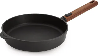 A black frying pan with a brown handle is shown against a white background.