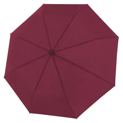 A top-down view of an open maroon umbrella.