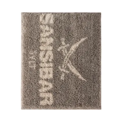 Produktbild von Sansibar Badematte mit Sansibar Logo Schriftzug, rutschhemmend beschichtet, Höhe 20 mm, taupe, 55x65 cm, fußbodenheizungsgeeignet, schnell trocknend