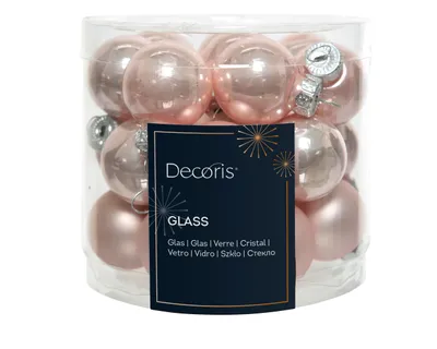A clear, well-lit studio shot of a package of Christmas ornaments.